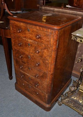 Lot 1100 - A Victorian figured walnut cupboard with six dummy drawers