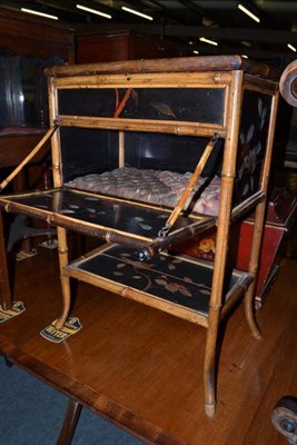 Lot 1117 - A bamboo Japanned small work box and three tier mahogany hanging shelves