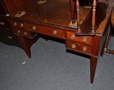 Lot 1120 - A late 19th century mahogany desk fitted five drawers