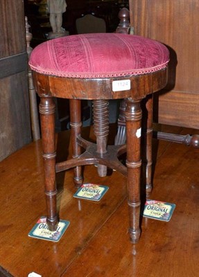 Lot 1124 - A Georgian piano stool