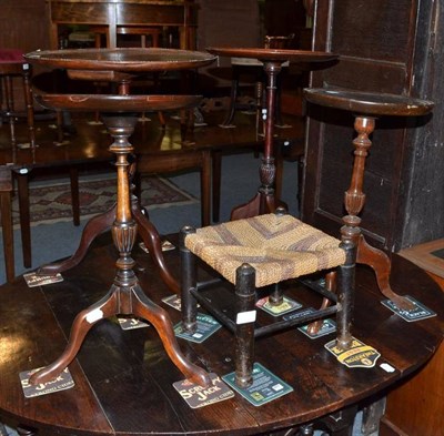 Lot 1126 - Four mahogany tripod wine tables, an Edwardian hanging cupboard and a small foot stool