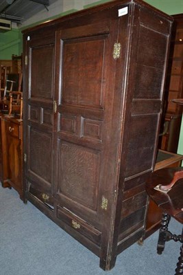 Lot 1127 - An 18th century oak press cupboard