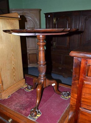 Lot 1131 - Mahogany tripod table in a George II style