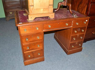 Lot 1133 - Mahogany pedestal desk with red leather insert