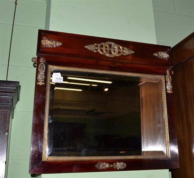 Lot 1150 - A Regency mahogany and brass mounted mirror