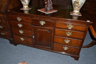 Lot 1156 - Late 18th century oak dresser base with later top