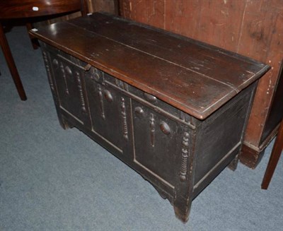 Lot 1159 - A 17th century joint oak chest with hinged lid and applied decoration