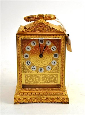 Lot 1 - A Gilt Metal Empire Style Striking Musical Mantel Clock, 20th century, with single scroll...