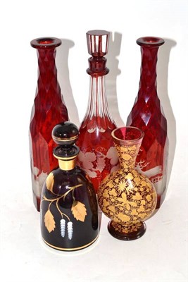 Lot 4 - A Pair of Late 19th Century Ruby Flash Decanters and Stoppers, engraved with hunting scenes, 32...
