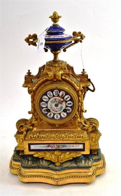 Lot 6 - A Gilt Metal And Porcelain Mounted Striking Mantel Clock, Circa 1890, surmounted by an urn and...