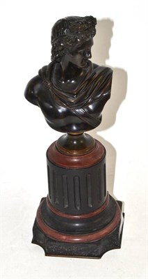 Lot 49 - A Bronze Bust of Apollo, on rouge and black marble socle, 31cm high