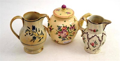 Lot 50 - Two 19th Century Pearlware Jugs; and An Early 19th Century Creamware Teapot (restored) (3)