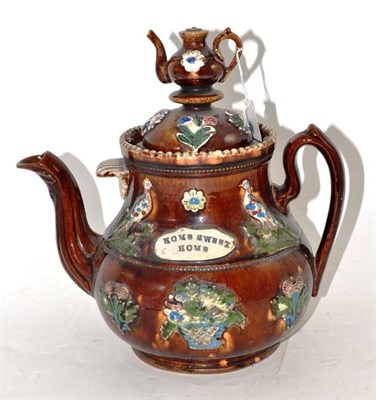 Lot 67 - A Meashamware Teapot, inscribed 'Home Sweet Home', 30cm high