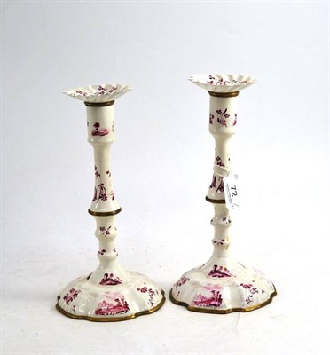 Lot 72 - A Pair of Staffordshire Enamel Candlesticks and Sconces, circa 1760, painted in puce monochrome...