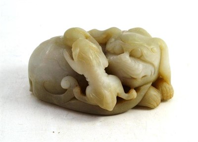 Lot 145 - A Chinese ";White Jade"; Recumbent Fo Dog and Pup