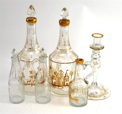 Lot 174 - A Pair of Late 18th Century Bohemian Glass Decanters and Stoppers, gilt with figures, 30cm...