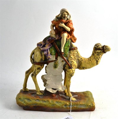 Lot 185 - An Austrian Porcelain Arab and Camel Dux Style Figure Group and a pair of late 19th century...