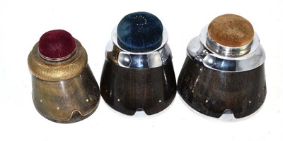 Lot 191 - Three Pin Cushions, each in the form of a horse's hoof with silver plated mounts, engraved...