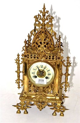 Lot 209 - A Gilt Metal Striking Mantel Clock, circa 1900, the Gothic style case with pierced and scrolled...
