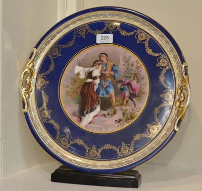 Lot 225 - A German Vienna Style Porcelain Cabaret Tray, on ebonised stand, 38cm diameter