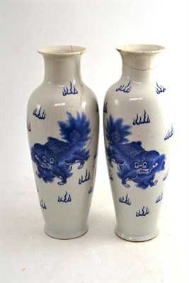 Lot 229 - A Pair of 19th Century Chinese Blue and White Vases, decorated with dogs of Fo and Chinese symbols