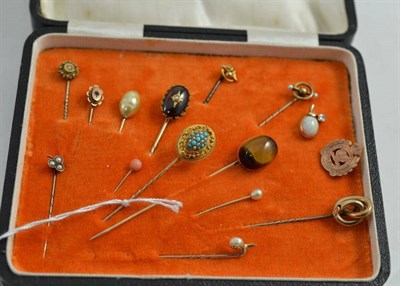 Lot 272 - Thirteen Assorted Stick Pins, including one set with turquoise and seed pearl, one with garnet...