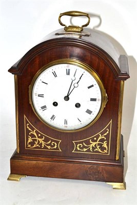 Lot 282 - A Mahogany Striking Mantel Clock, circa 1890, arched case with carrying handle, brass inlaid front