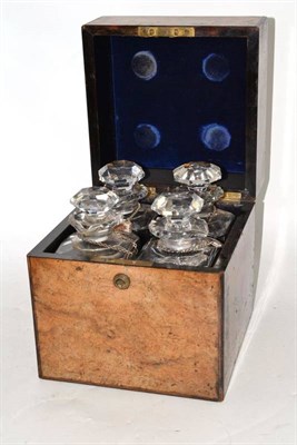 Lot 285 - A Victorian Burr Walnut Decanter Box, with hinged lid and four rectangular glass decanters,...