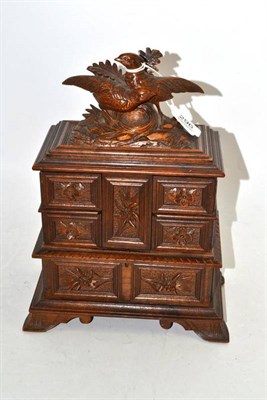 Lot 296 - A Late 19th Century Carved Linden Wood Jewellery Casket, with hinged lid and bird finials,...