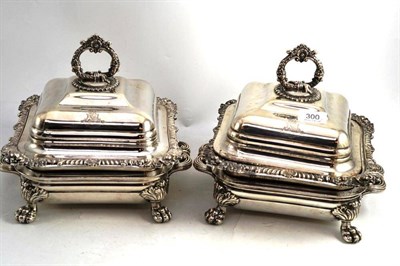 Lot 300 - A Pair of Sheffield Plate Entree Dishes, each engraved with a family crest, with square form...