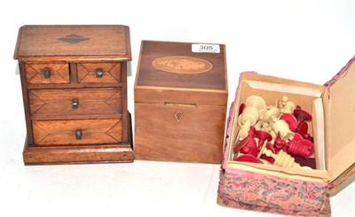 Lot 305 - A 19th Century Mahogany Tea Caddy, of square form; A Miniature Mahogany Four Drawer Chest; and...