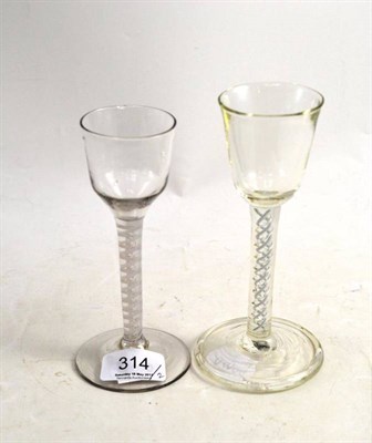 Lot 314 - A Wine Glass, circa 1760, with lace outlined air twist stem, height 15cm; and A Drinking Glass,...