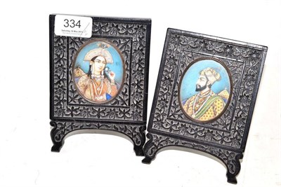 Lot 334 - A Pair of Moghul Oval Miniatures, with bust portraits of a lady and gentleman, 6.5cm by 5cm, in...