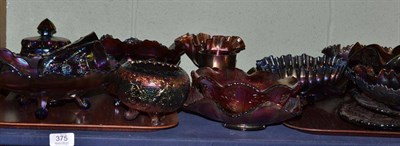 Lot 375 - Twenty Four Pieces Mainly Amethyst Coloured Carnival Pressed Glass, comprising shaped bowls,...