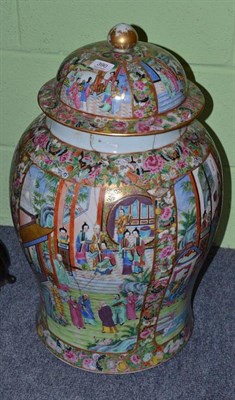 Lot 390 - A Large Cantonese Baluster Jar and Cover, typically painted with panels of figures, 64cm high