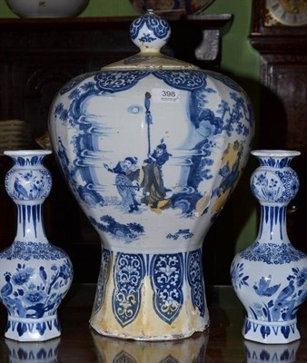 Lot 398 - An 18th Century German Faience Panelled Baluster Form Vase and Cover, with chinoiserie...