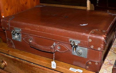 Lot 401 - A Leather Suitcase, initialled EC, fitted interior and silver-topped jars, 62cm wide