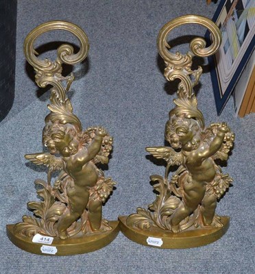 Lot 414 - A Pair of Gilt Cherub Door Stops