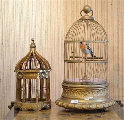 Lot 421 - An Early 20th Century Musical Bird, in a brass domed bird cage, with key, height 55cm; and A Modern