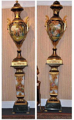 Lot 423 - A Pair of Large Sevres Style Vases and Covers on Stands, of recent date, each decorated with...