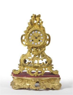 Lot 427 - A French Gilt Metal Striking Mantel Clock, signed Raingo, A Paris, circa 1850,  elaborate...