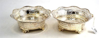 Lot 438 - A Matched Pair of George V Dessert Baskets, Goldsmiths & Silversmiths Co Ltd, London 1910 and...