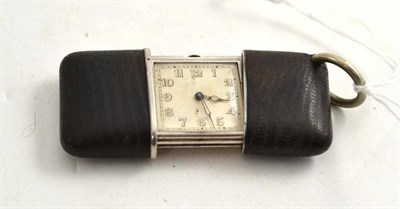 Lot 456 - A Purse Watch, signed Movado, circa 1940, lever movement, silvered dial with Arabic numerals,...