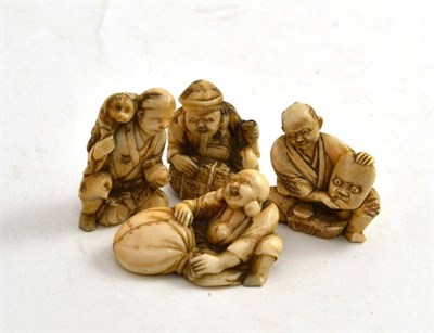 Lot 457 - Four Early 20th Century Japanese Netsukes, each as seated figures, 2.5cm to 4cm high