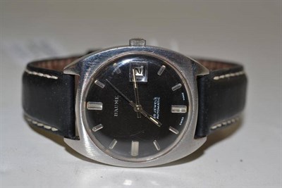 Lot 458 - A Stainless Steel Automatic Calendar Centre Seconds Wristwatch, signed Baume, lever movement, black