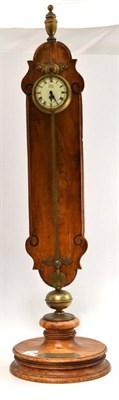 Lot 532 - A Rack Timepiece, 20th century, shaped backboard supporting the rack and movement, on a...