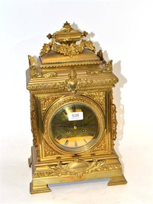 Lot 538 - A Brass Striking Mantel Clock, circa 1890, swag and scroll decoration, 5-inch dial with Roman...