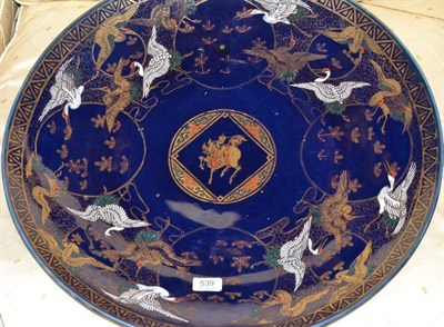 Lot 539 - A Large Early 20th Century Japanese Charger, decorated with cranes on blue and gilt ground,...