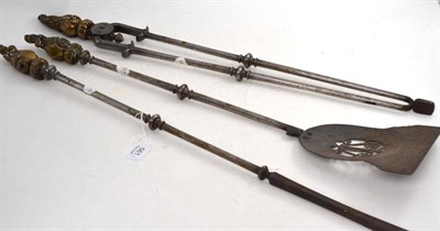 Lot 561 - A Set of Three Steel Fire Irons, with brass handles