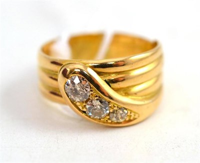 Lot 573 - An 18 Carat Gold Diamond Set Snake Ring, the head inset with three graduated old cut diamonds,...